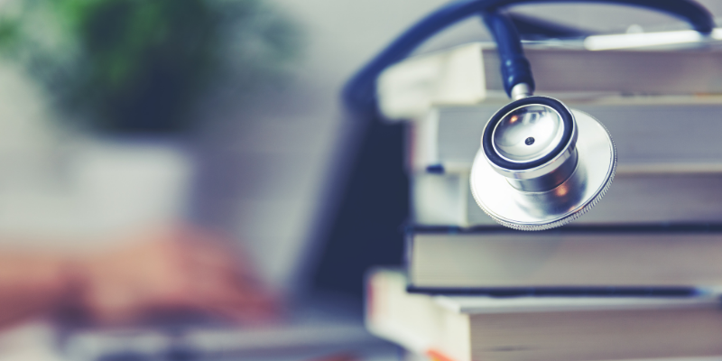 Image of stethoscope and books